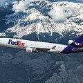 FedEx Over Snowcapped Mountains